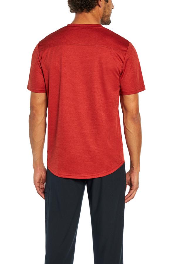 Balance Collection For Men Base Tee, side view showing pocket placement, showing visible design features and texture of the soft knit fabric..