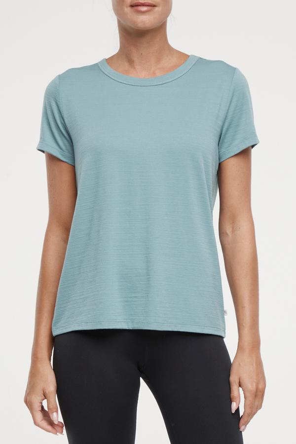 Harmony Short Sleeve Tee, alternate angle view, showing visible design features and texture of the soft knit fabric.