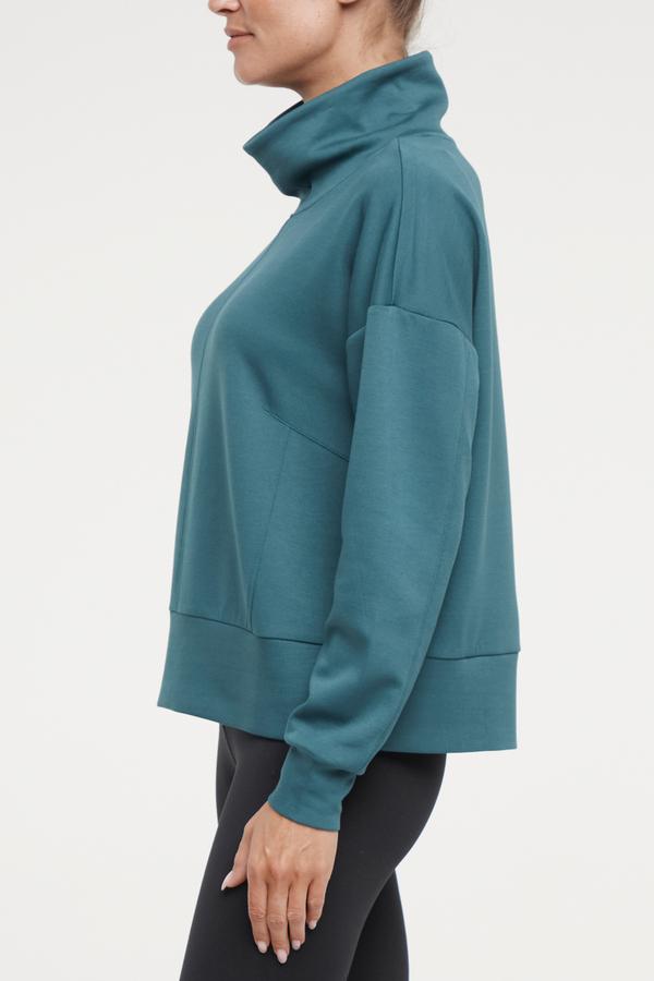 Sage Knit Pullover, alternate angle view, showing visible design features and texture of the soft knit fabric..