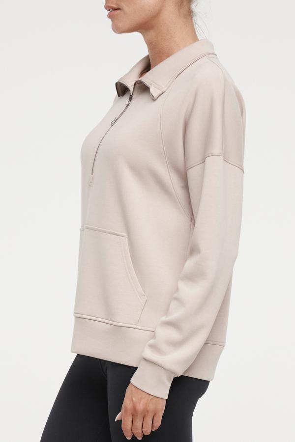 Sage 1/2 Zip, alternate angle view, showing visible design features and texture of the soft knit fabric..