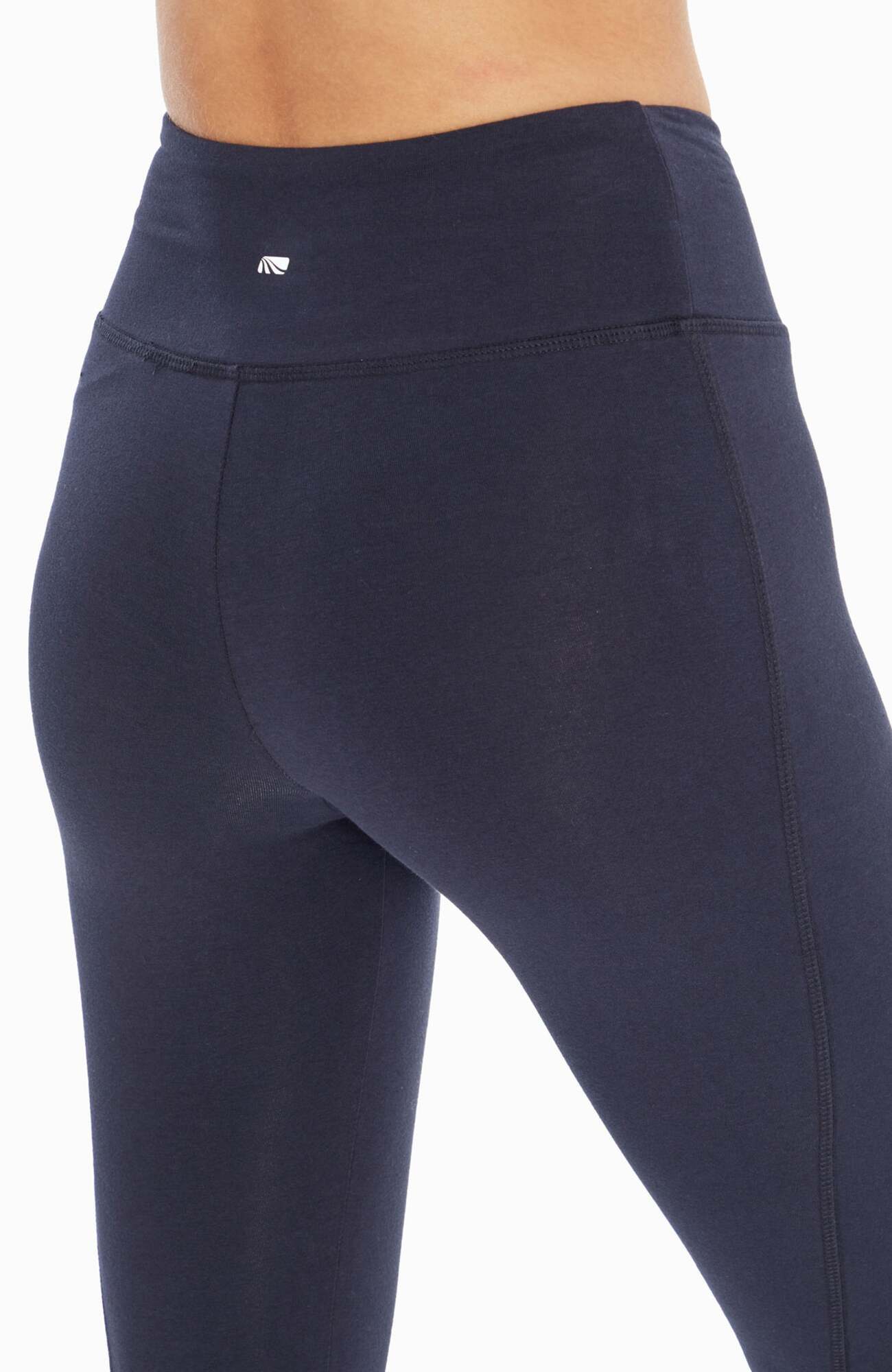 Carrie Slimming Capri, side view showing pocket placement, showing visible design features and texture of the soft knit fabric..