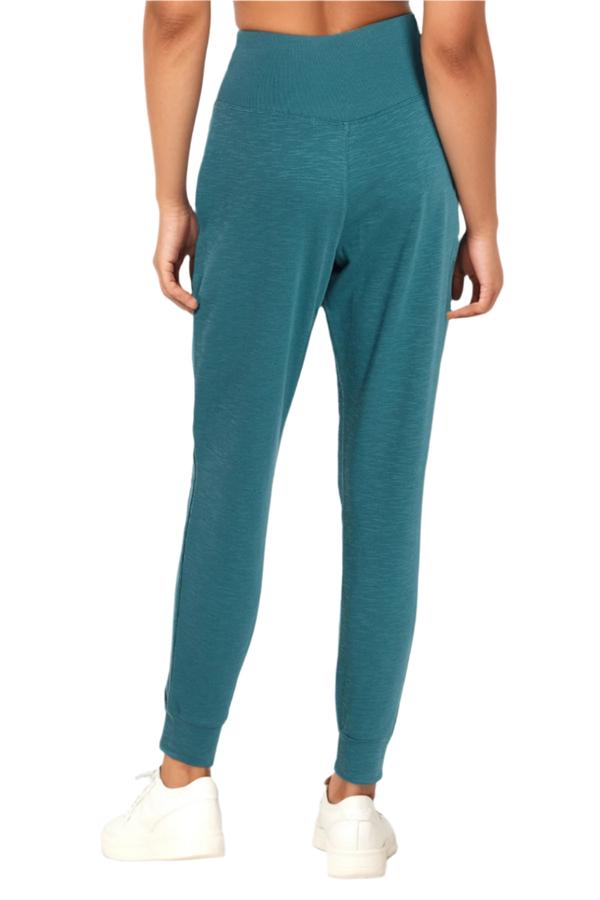 Jenny Jogger, side view showing pocket placement, showing visible design features and texture of the soft knit fabric..