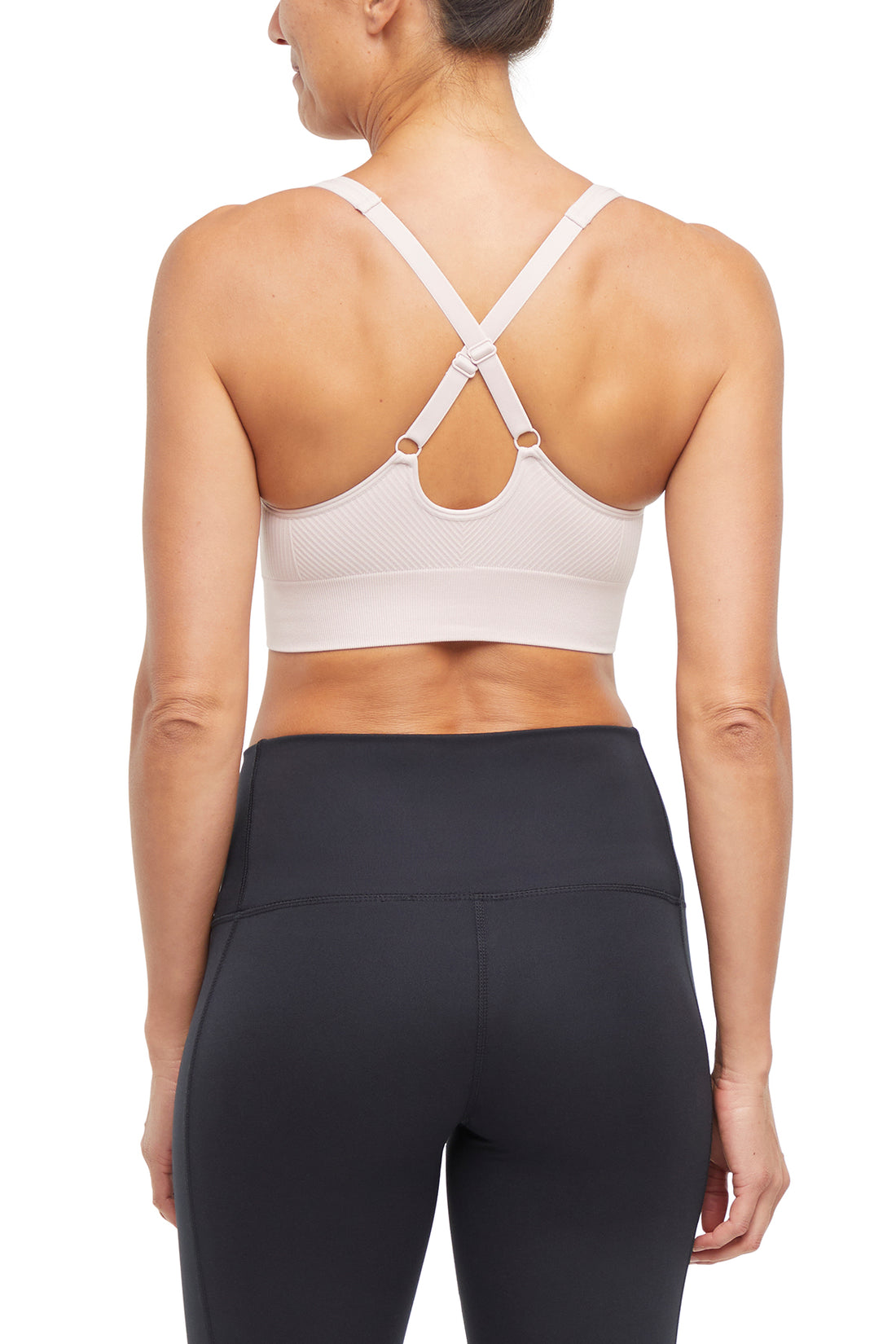 Addie Seamless Sports Bra, close-up view of fabric and stitching, showing visible design features and texture of the soft knit fabric..
