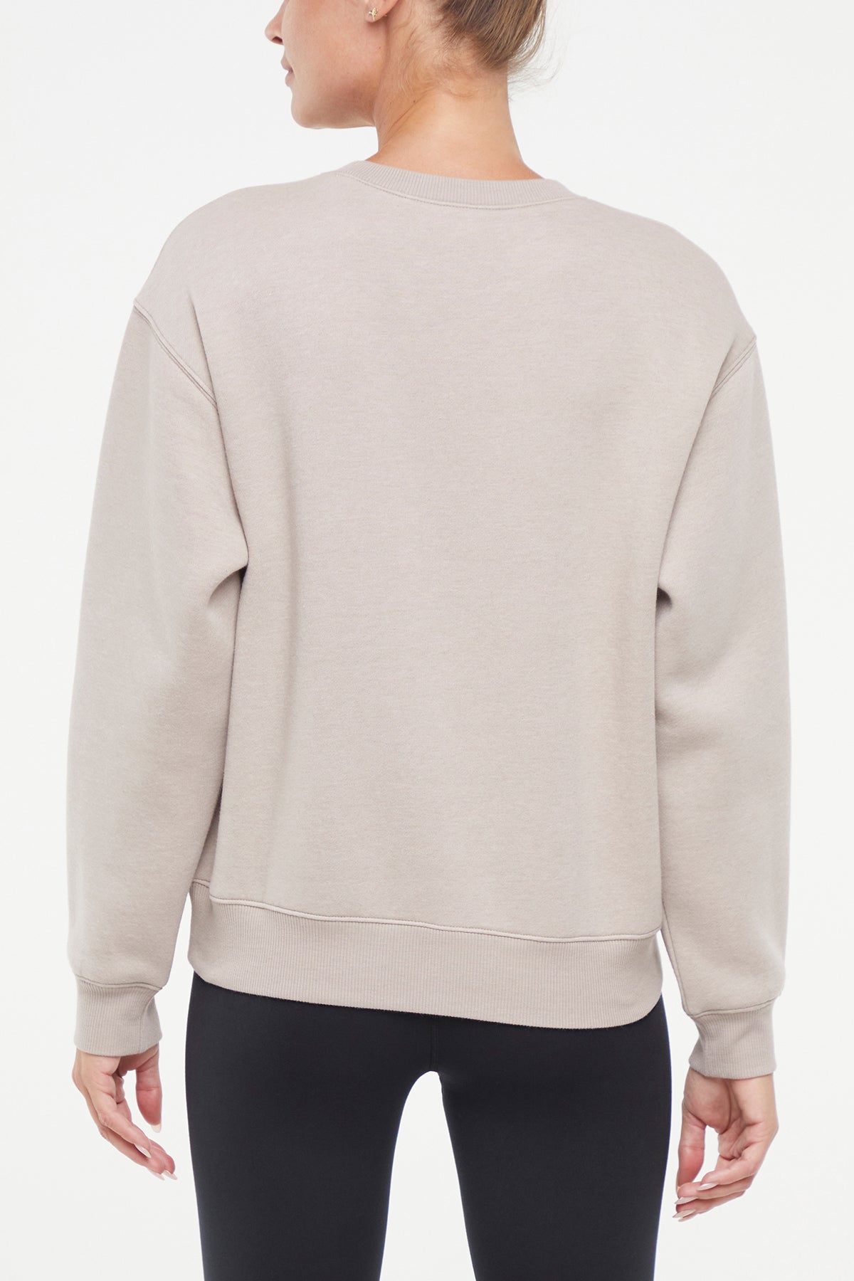 Meira Fleece Sweatshirt, alternate angle view, showing visible design features and texture of the soft knit fabric..