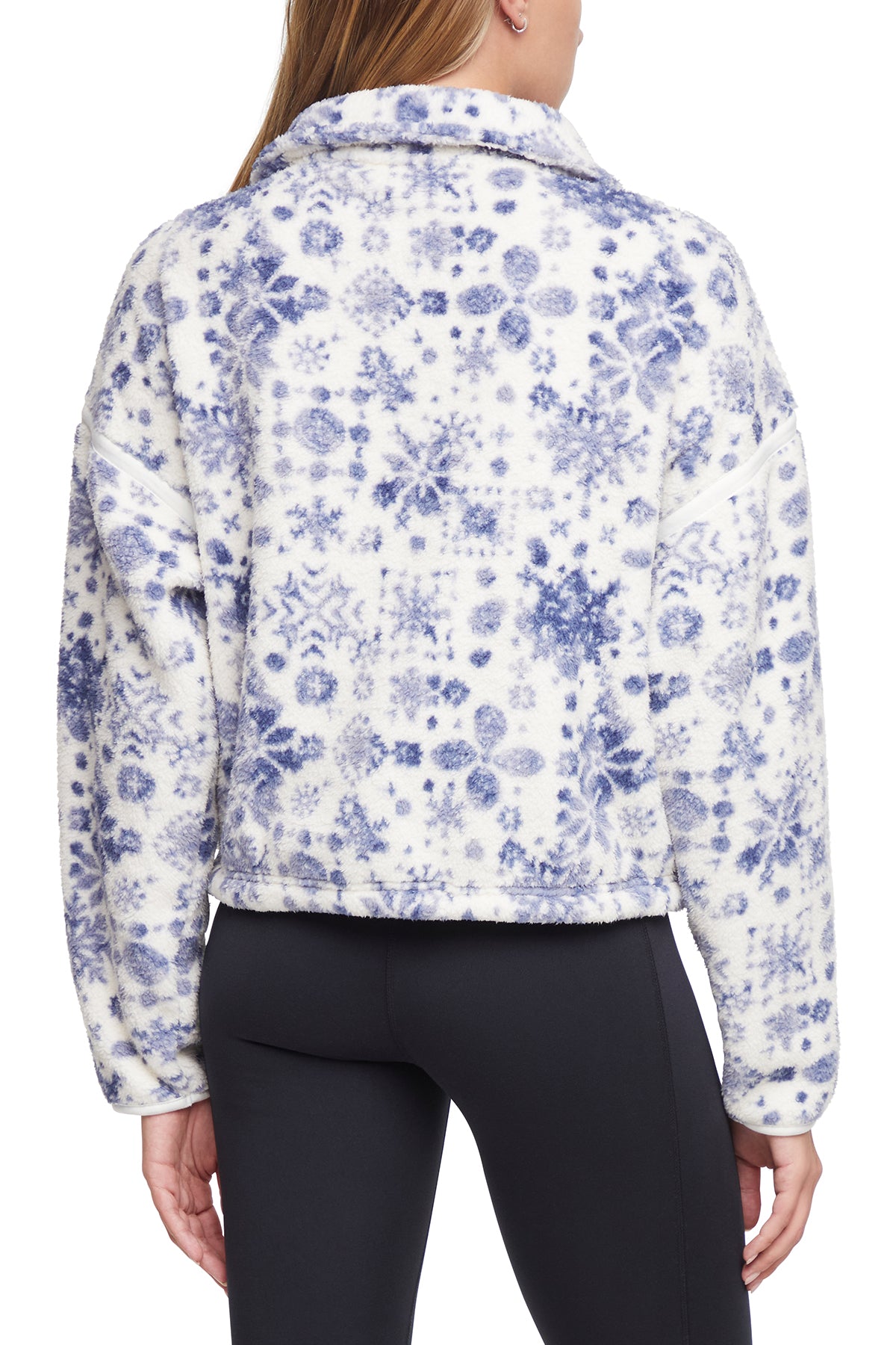 Blair Sherpa Jacket, side view showing pocket placement, showing visible design features and texture of the smooth woven fabric..