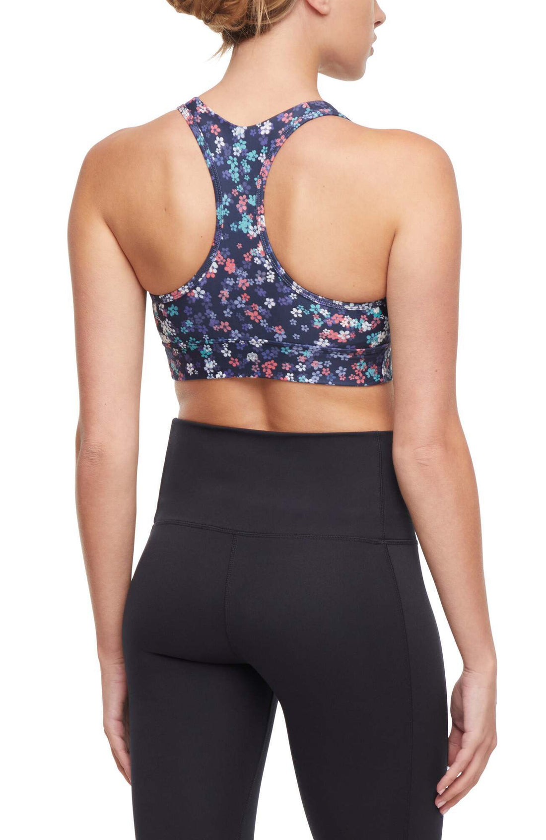 Rubina Sports Bra, alternate angle view, showing visible design features and texture of the soft knit fabric..