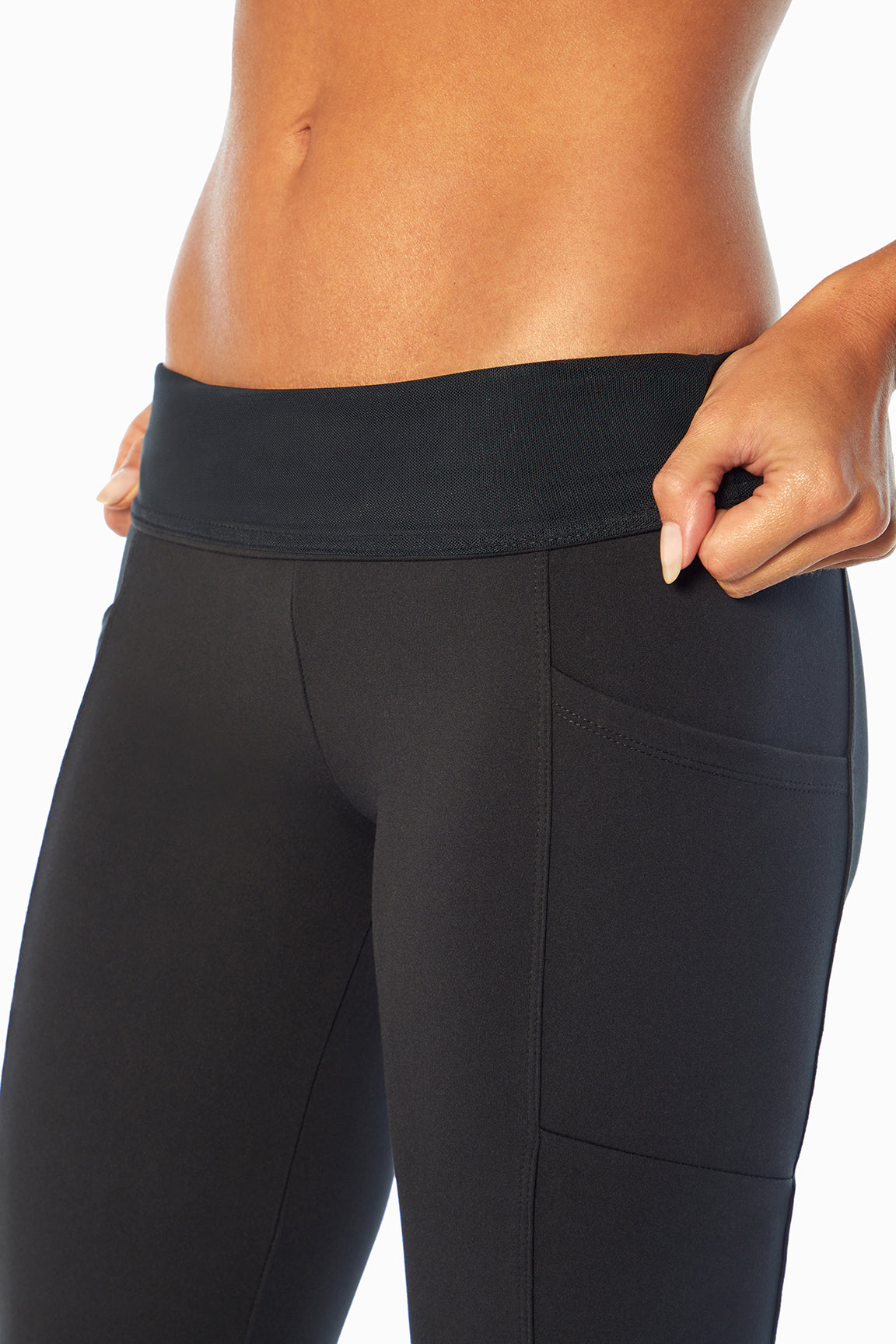 Eclipse Side Pocket Tummy Control Yoga Pant, close-up view of fabric and stitching, showing visible design features and texture of the durable..