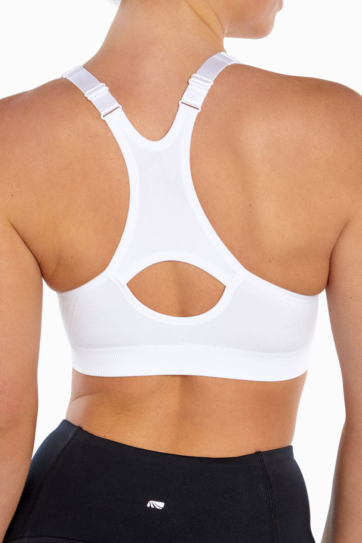 Savannah Seamless Front Zip Sports Bra, side view showing pocket placement, showing visible design features and texture of the soft knit fabric..