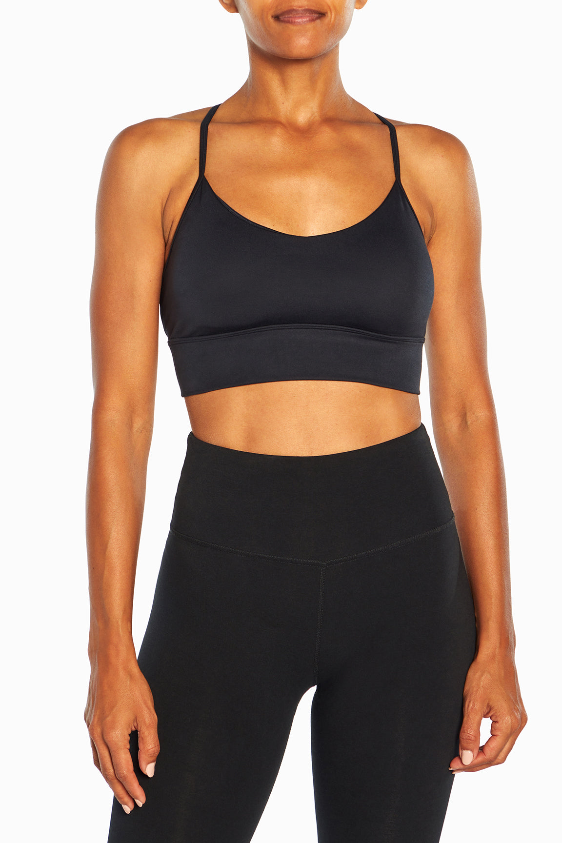 Alli Sports Bra, close-up view of fabric and stitching, showing visible design features and texture of the soft knit fabric..