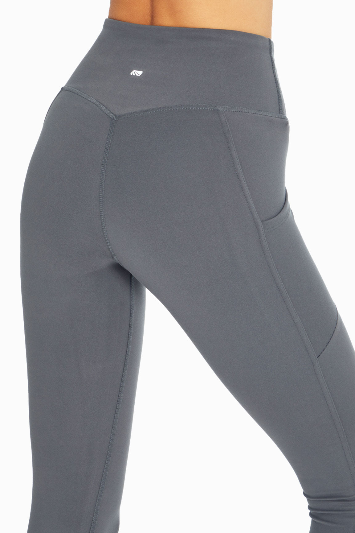 Cameron Side Pocket Tummy Control Legging, alternate angle view, showing visible design features and texture of the stretch knit fabric..