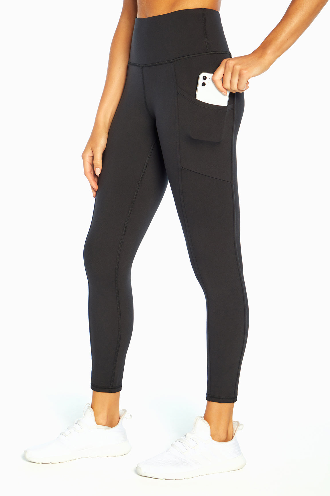 Eclipse Side Pocket Tummy Control Ankle Legging, front view, showing visible design features and texture of the stretch knit fabric..