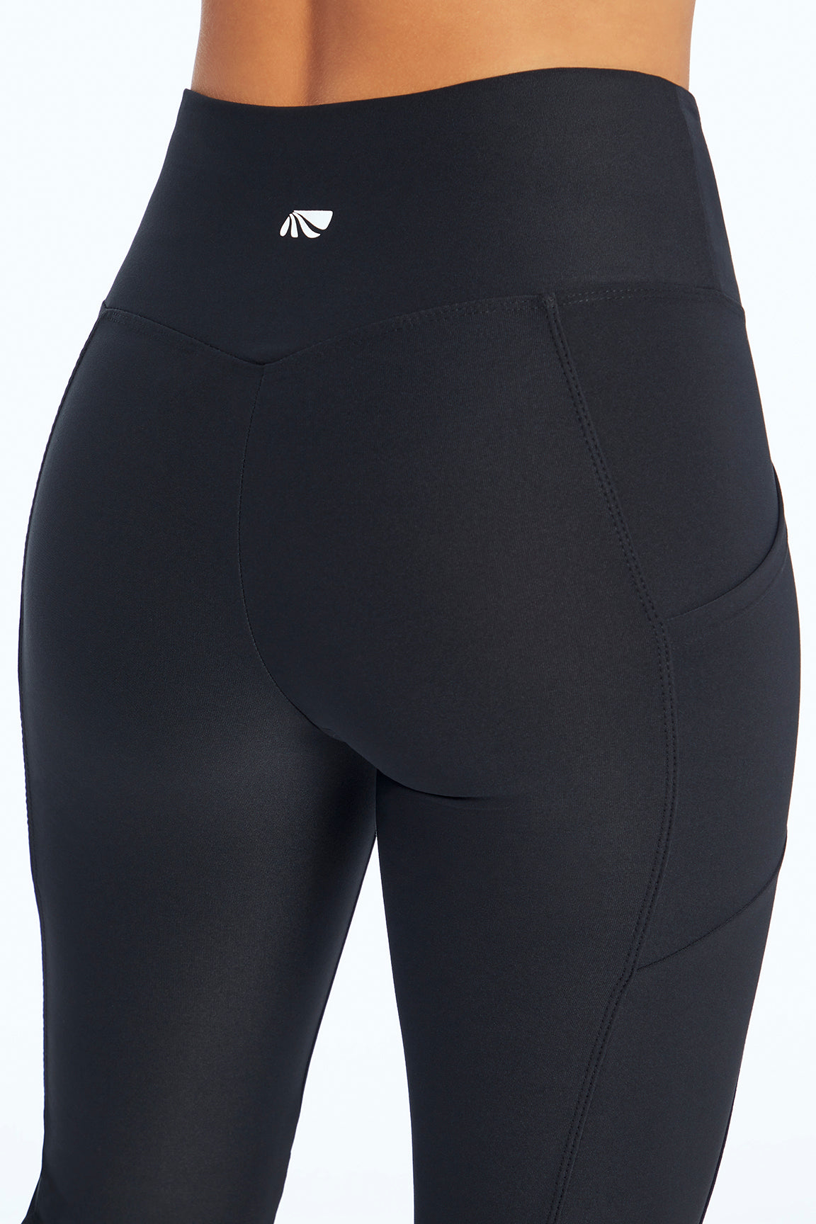 Eclipse Side Pocket Tummy Control Yoga Pant, back view, showing visible design features and texture of the durable stretch fabric..