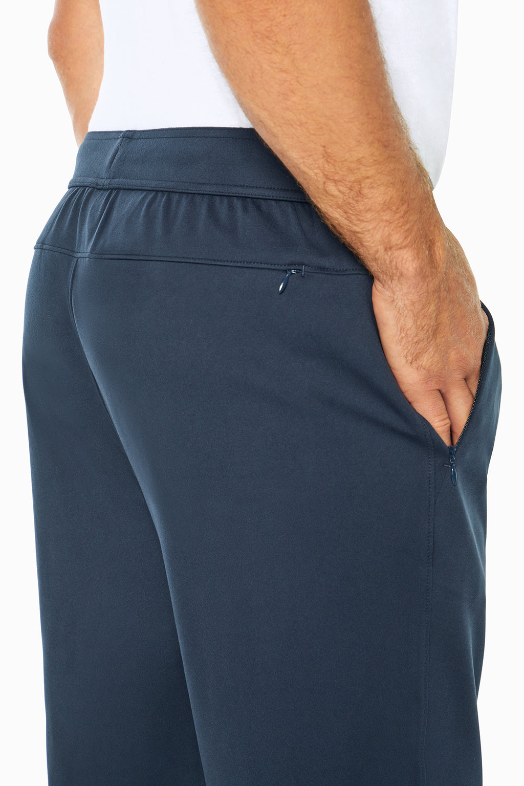 Balance Collection For Men Commuter Pant, side view showing pocket placement, showing visible design features and texture of the durable stretch.. #color_outer-space