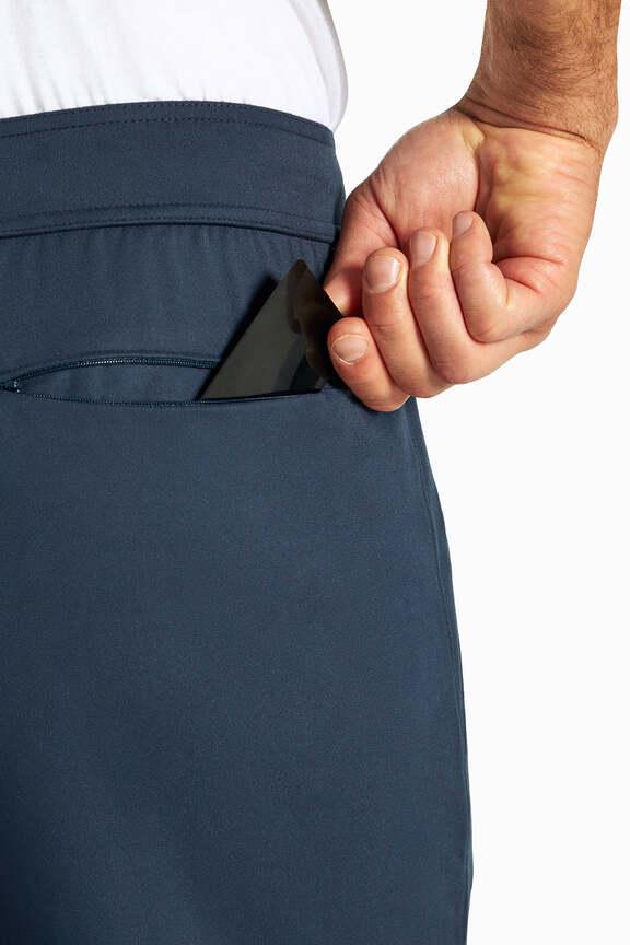 Balance Collection For Men Commuter Pant, back view, showing visible design features and texture of the durable stretch fabric.. #color_outer-space