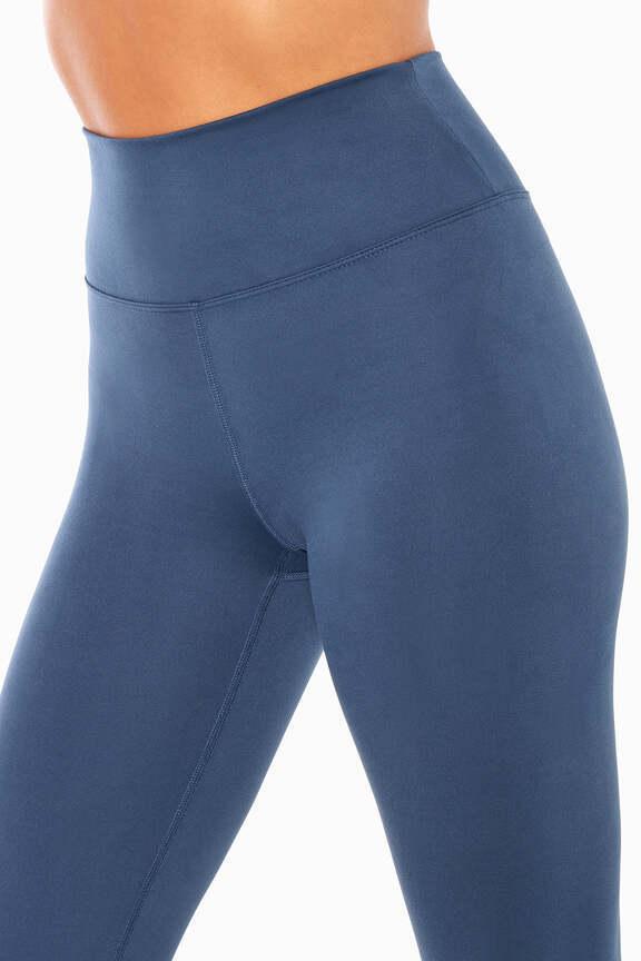 Balance Collection Barely Flare Pant, alternate angle view, showing visible design features and texture of the durable stretch fabric.. 