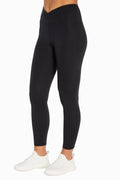 Balance Collection Crossover Legging, front view, showing visible design features and texture of the stretch knit fabric.. #color_black