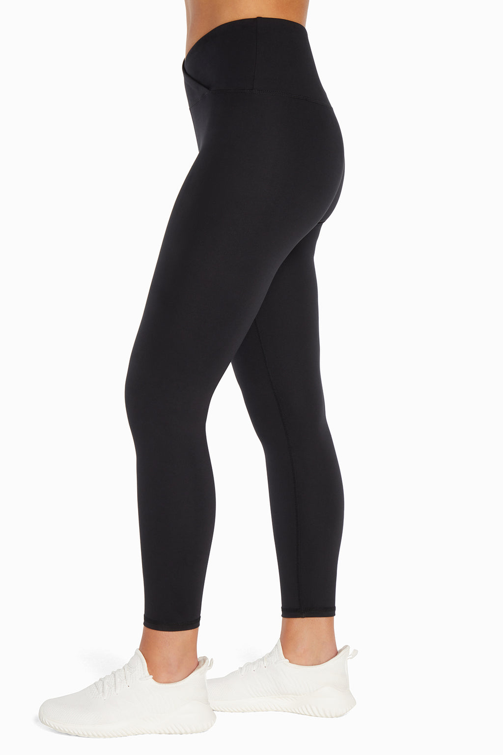 Balance Collection Crossover Legging, alternate angle view, showing visible design features and texture of the stretch knit fabric.. #color_black