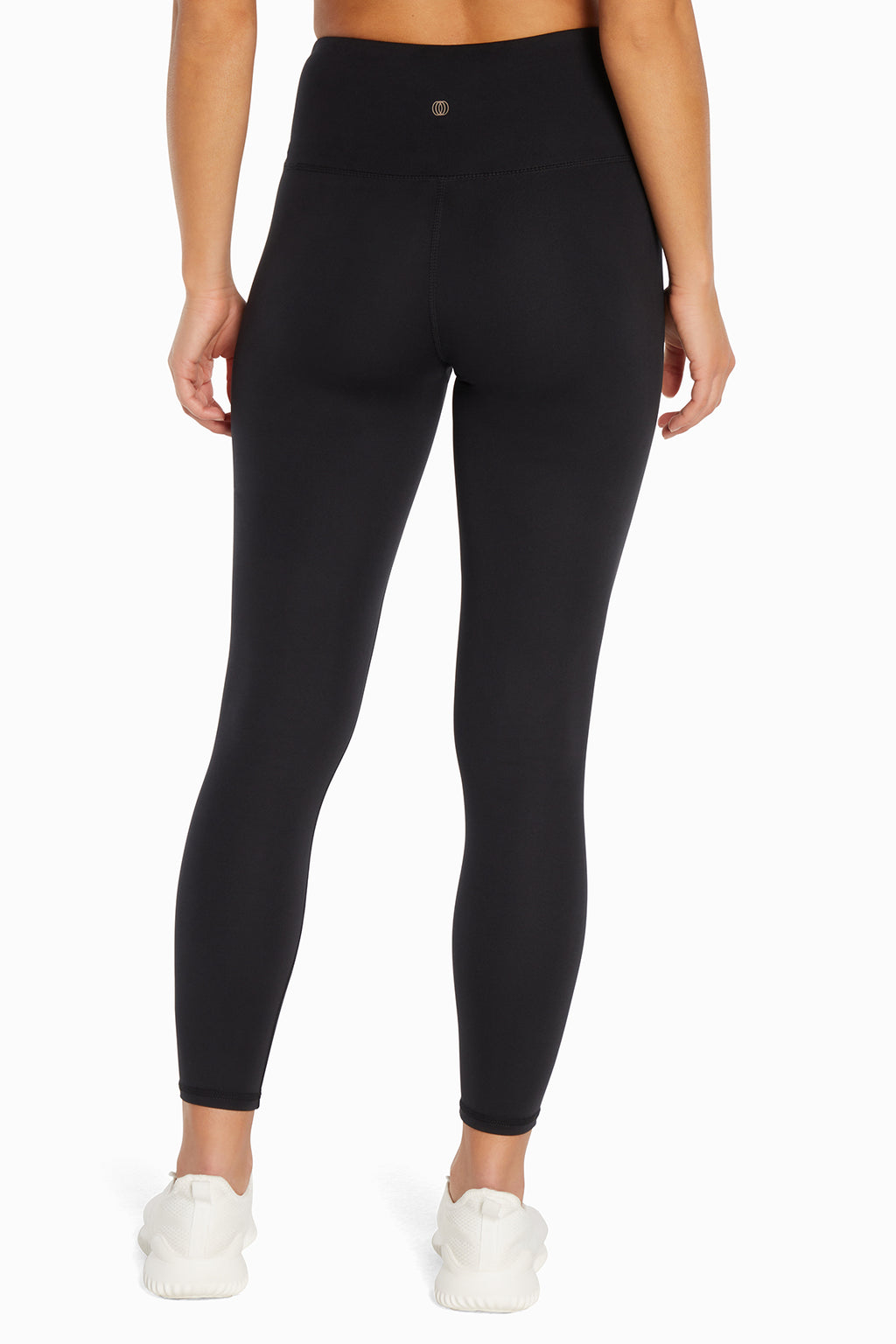 Balance Collection Crossover Legging, back view, showing visible design features and texture of the stretch knit fabric.. #color_black