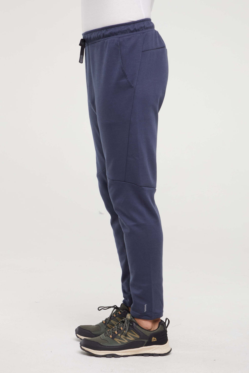 Balance Collection For Men Chandler Pant, alternate angle view, showing visible design features and texture of the durable stretch fabric.. #color_blue-nights