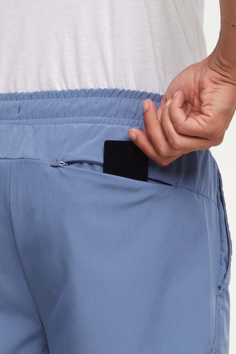 Balance Collection For Men Pablo Short, side view showing pocket placement, showing visible design features and texture of the soft knit fabric.. 