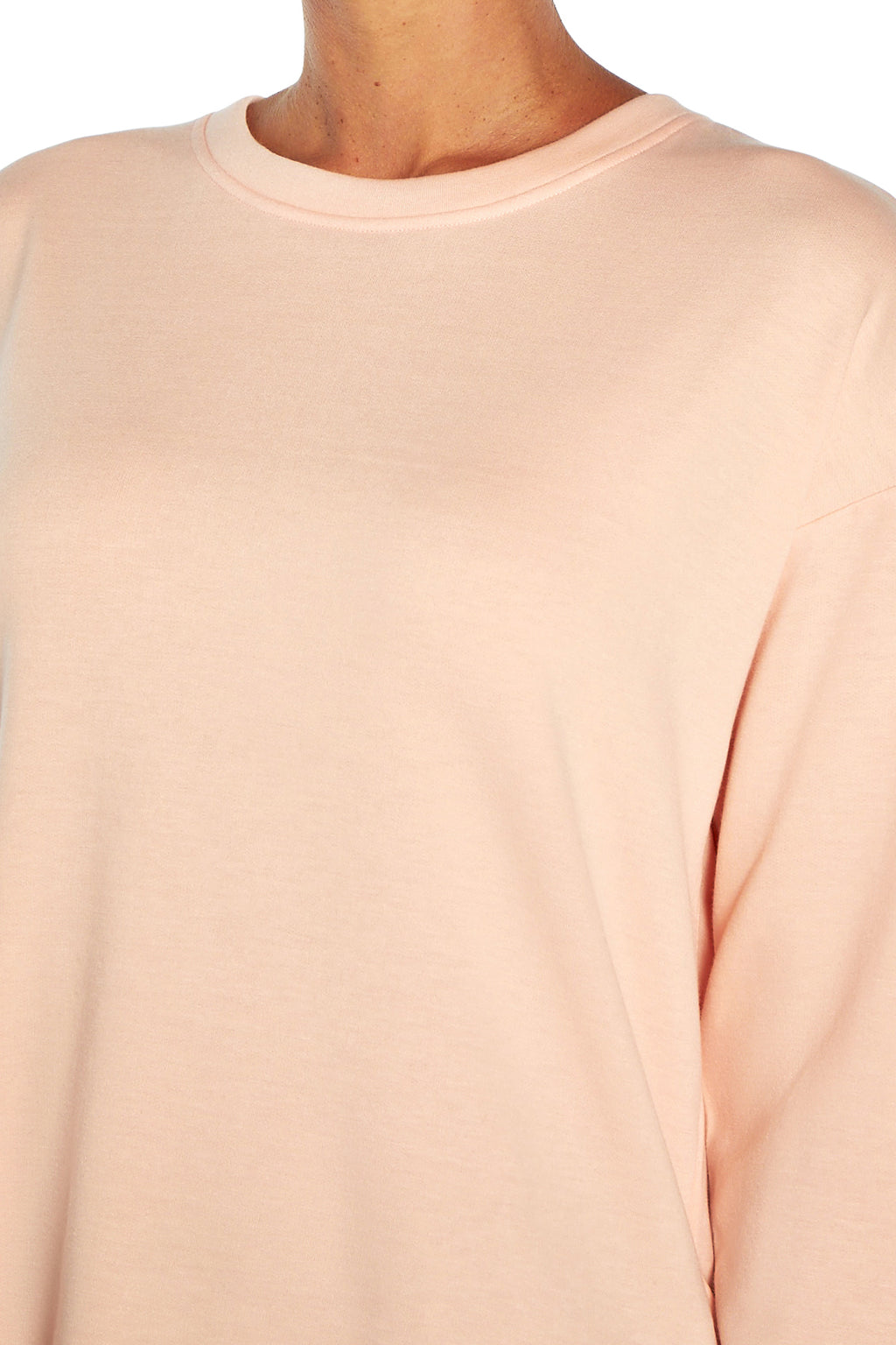 Linda Long Sleeve Pullover, back view, showing visible design features and texture of the soft knit fabric.. #color_tropical-peach