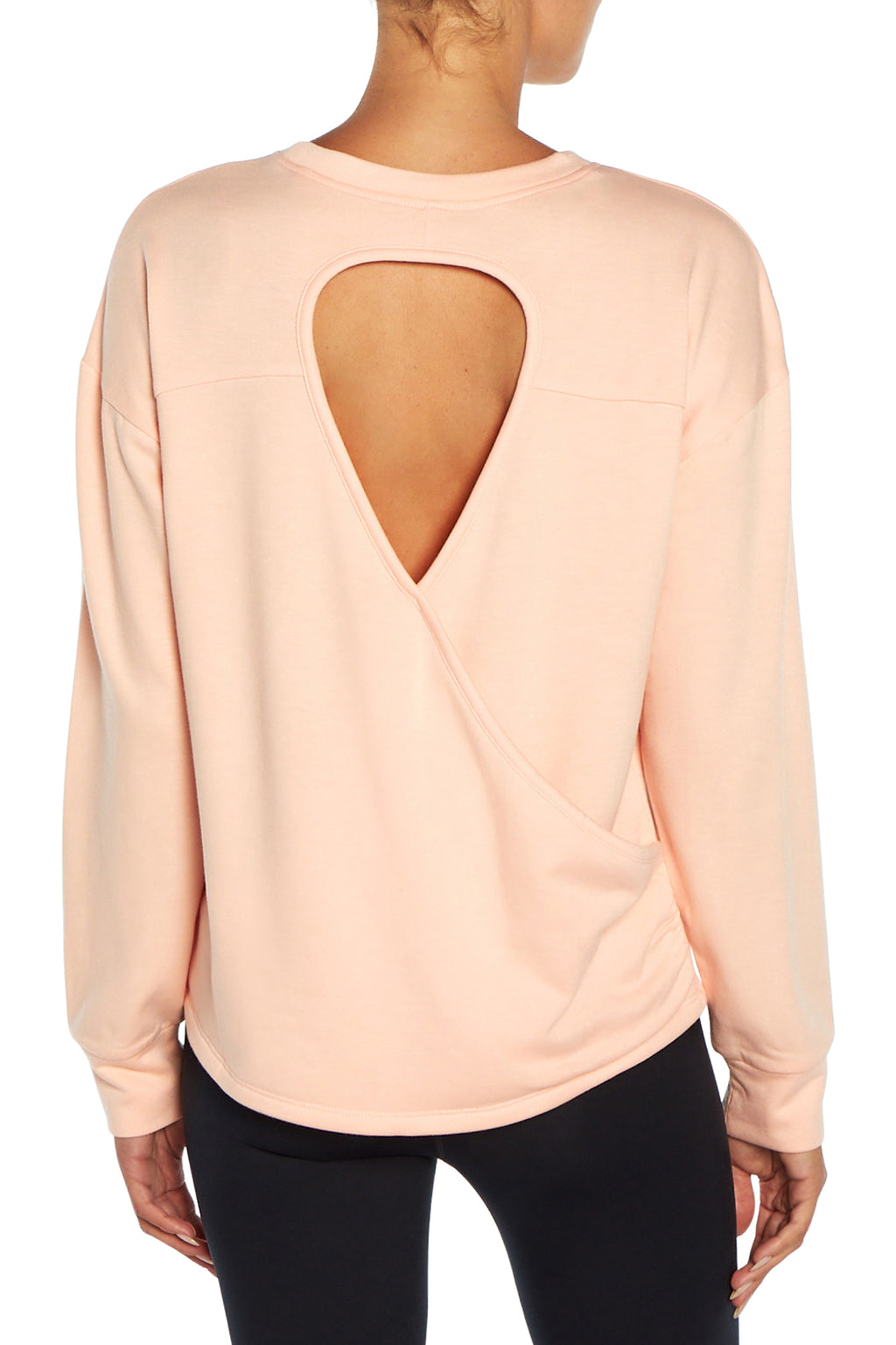 Linda Long Sleeve Pullover, close-up view of fabric and stitching, showing visible design features and texture of the soft knit fabric.. #color_tropical-peach