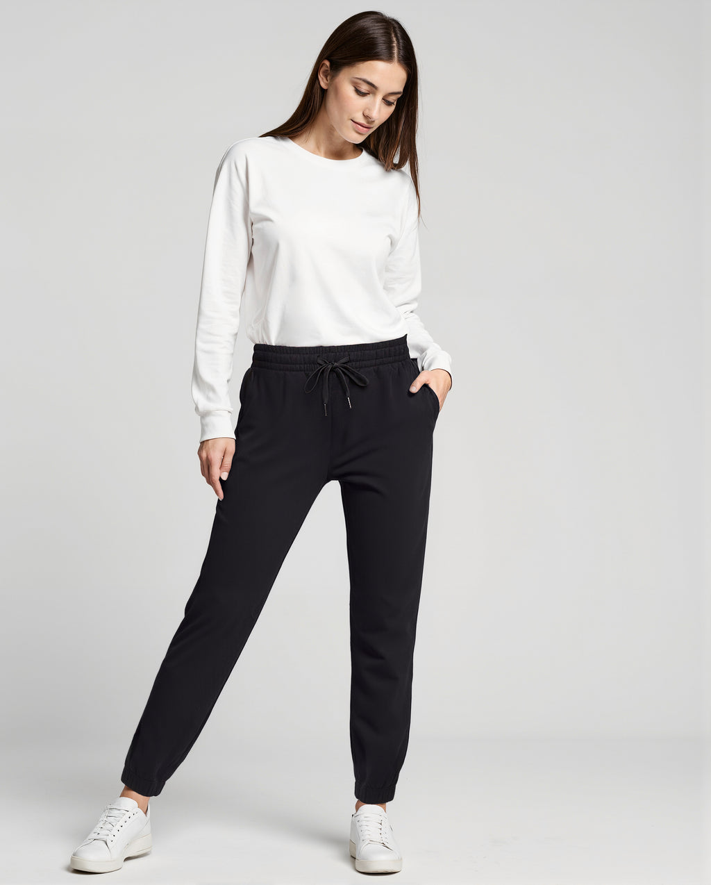 Camila Jogger, close-up view of fabric and stitching, showing visible design features and texture of the soft knit fabric.. #color_black