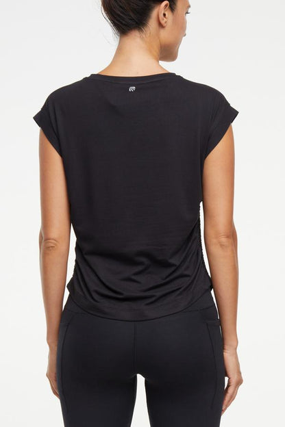 Zoey Short Sleeve Top, alternate angle view, showing visible design features and texture of the soft knit fabric.. 