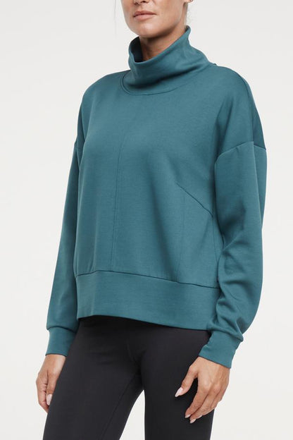 Sage Knit Pullover, alternate angle view, showing visible design features and texture of the soft knit fabric.. 