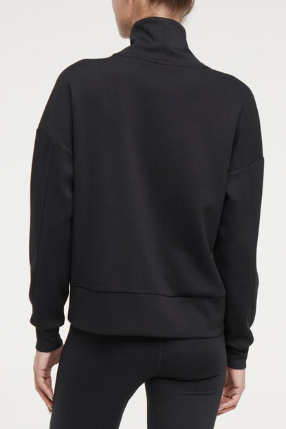 Sage Knit Pullover, alternate angle view, showing visible design features and texture of the soft knit fabric.. 