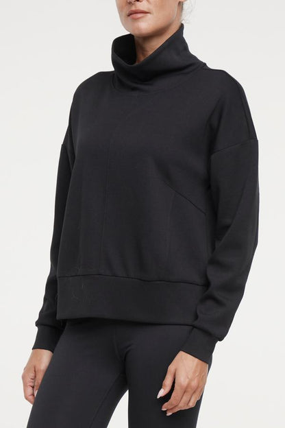Sage Knit Pullover, alternate angle view, showing visible design features and texture of the soft knit fabric.. 
