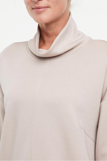 Sage Knit Pullover, alternate angle view, showing visible design features and texture of the soft knit fabric.. 