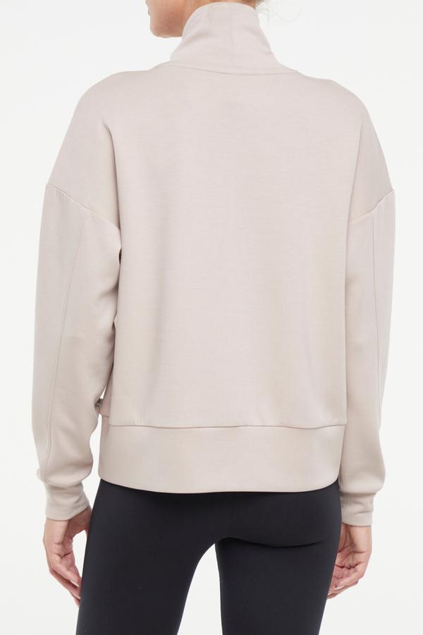 Sage Knit Pullover, alternate angle view, showing visible design features and texture of the soft knit fabric.. 