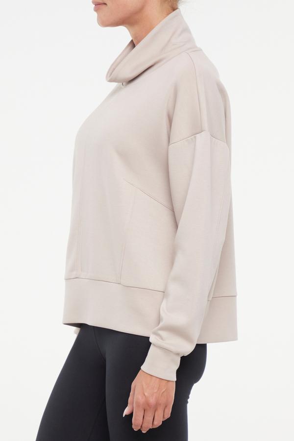 Sage Knit Pullover, alternate angle view, showing visible design features and texture of the soft knit fabric.. 