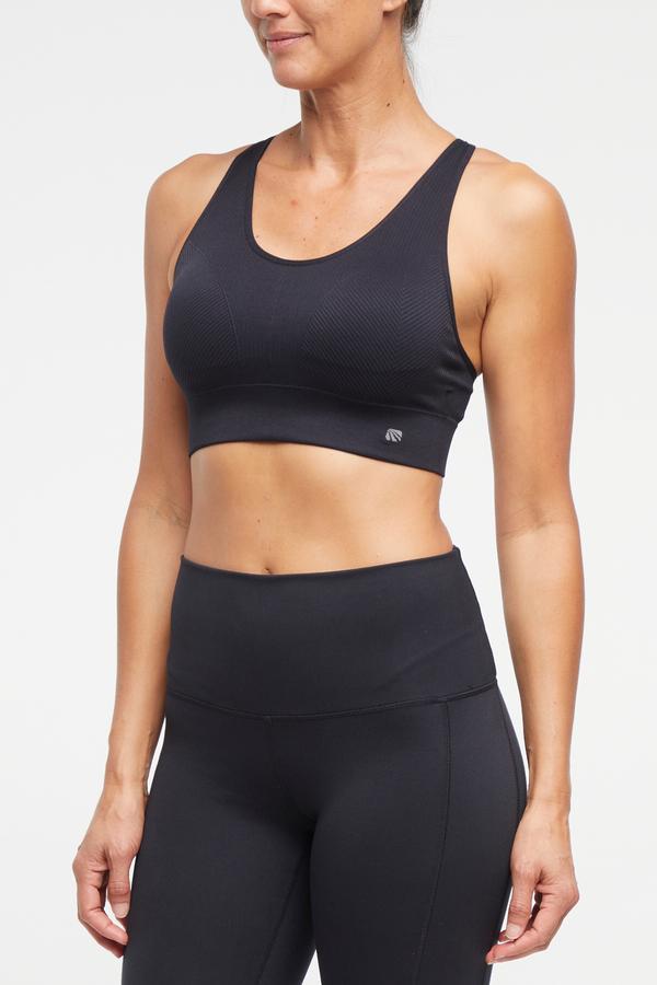 Addie Seamless Sports Bra, alternate angle view, showing visible design features and texture of the soft knit fabric.. 