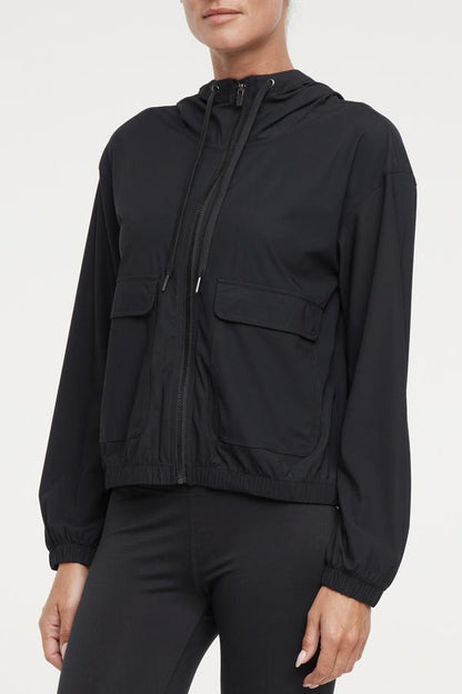 Nori Jacket, alternate angle view, showing visible design features and texture of the smooth woven fabric.. 