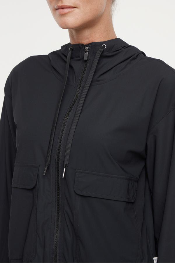 Nori Jacket, alternate angle view, showing visible design features and texture of the smooth woven fabric.. 