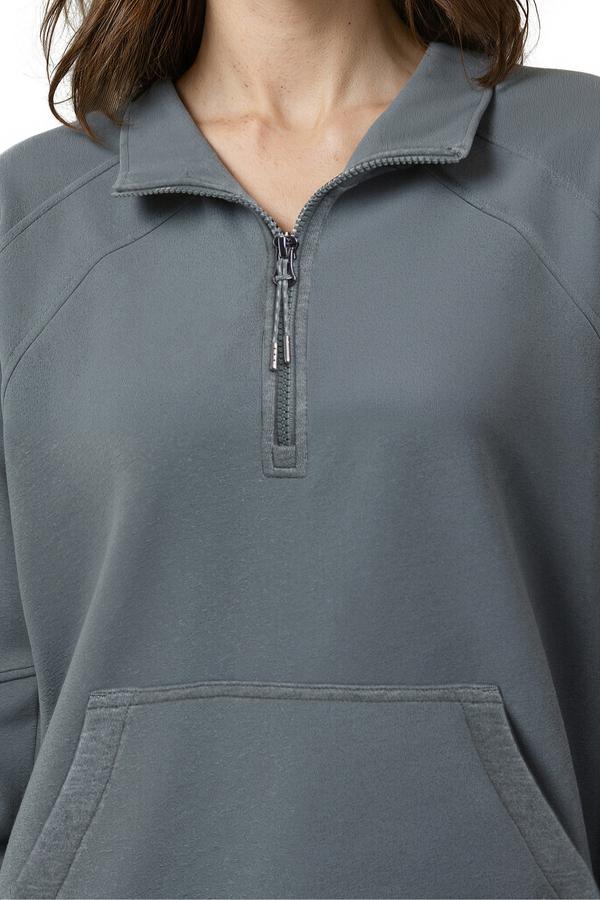 Camila 1/4 Zip Jacket, alternate angle view, showing visible design features and texture of the smooth woven fabric.. 