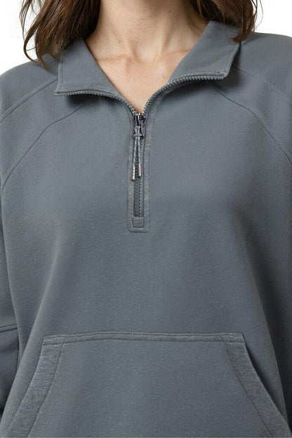 Camila 1/4 Zip Jacket, alternate angle view, showing visible design features and texture of the smooth woven fabric.. 