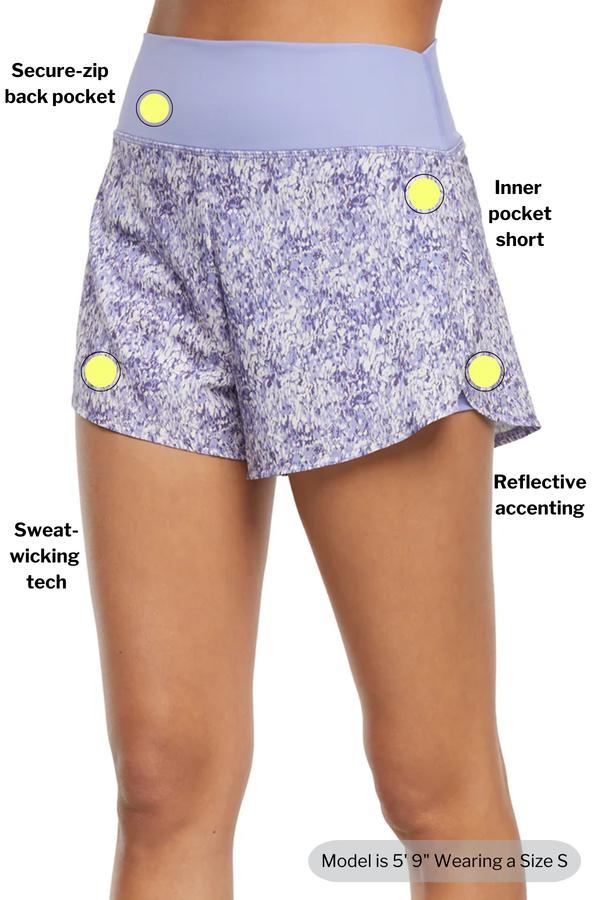 Becca Short, close-up view of fabric and stitching, showing visible design features and texture of the soft knit fabric.. 