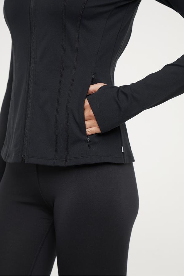 Kate Jacket, alternate angle view, showing visible design features and texture of the smooth woven fabric.. 