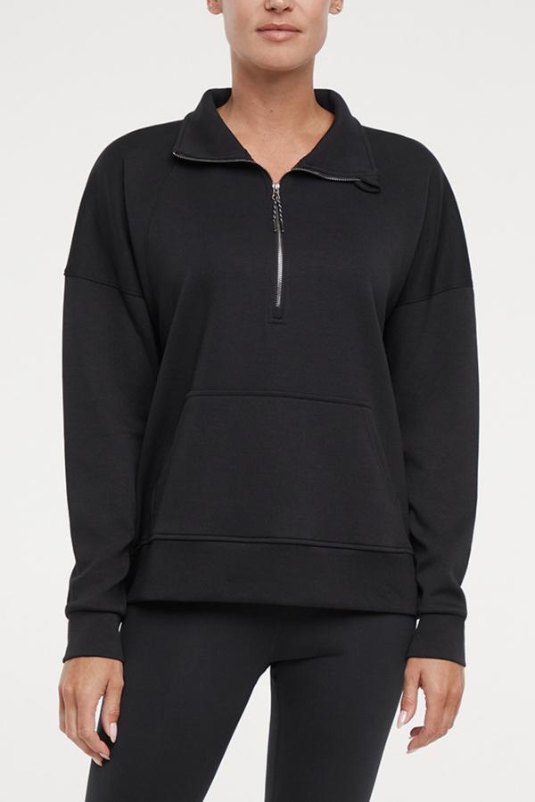 Sage 1/2 Zip, alternate angle view, showing visible design features and texture of the soft knit fabric.. #color_black