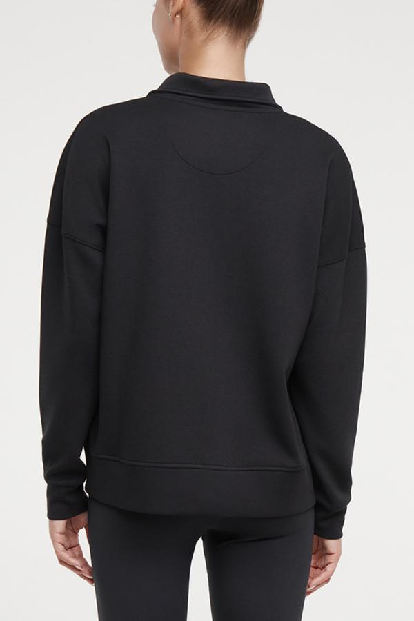 Sage 1/2 Zip, alternate angle view, showing visible design features and texture of the soft knit fabric.. #color_black