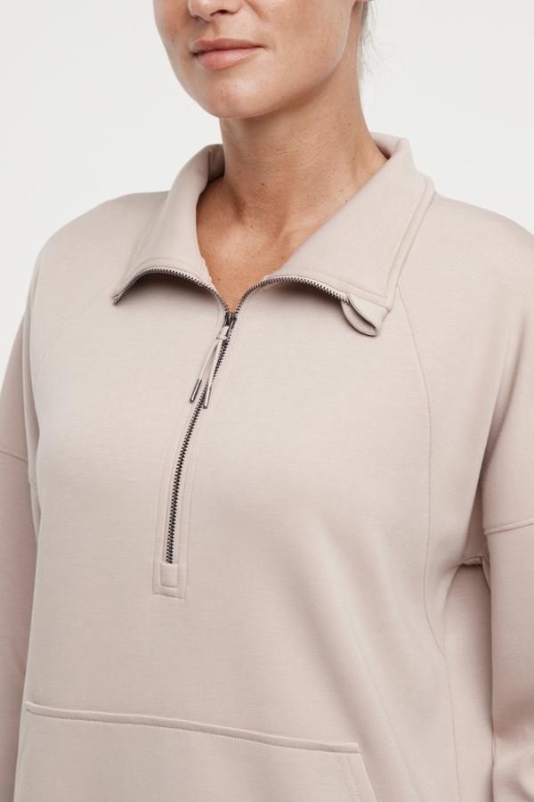 Sage 1/2 Zip, alternate angle view, showing visible design features and texture of the soft knit fabric.. 