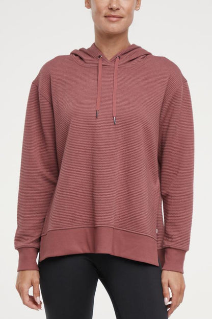 Cora Pullover Hoodie, alternate angle view, showing visible design features and texture of the soft fleece fabric.. 