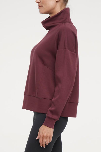 Sage Knit Pullover, alternate angle view, showing visible design features and texture of the soft knit fabric.. 