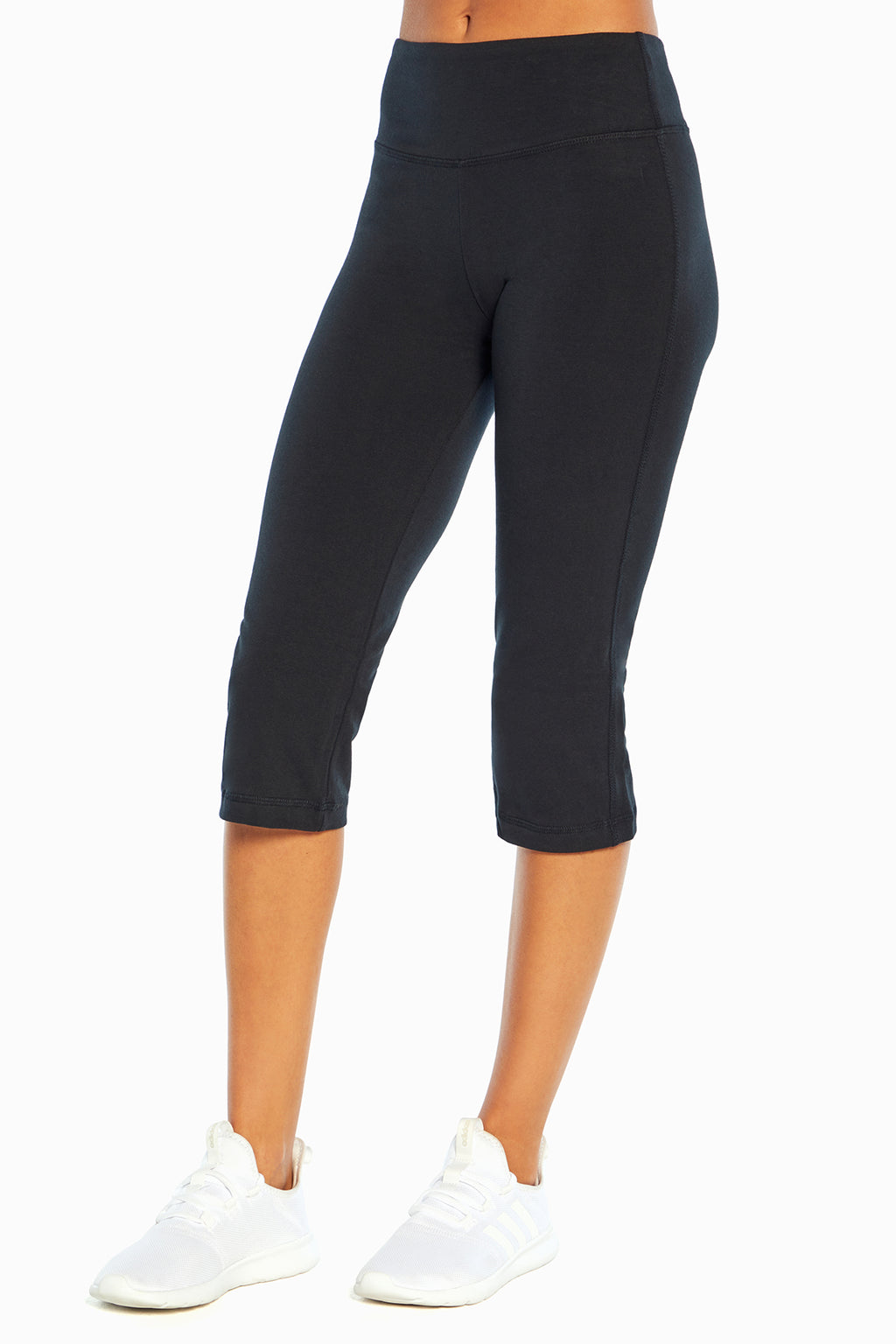 Zoey Tummy Control Capris, front view showing pocket placement, showing visible design features and texture of the soft knit fabric. #color_black