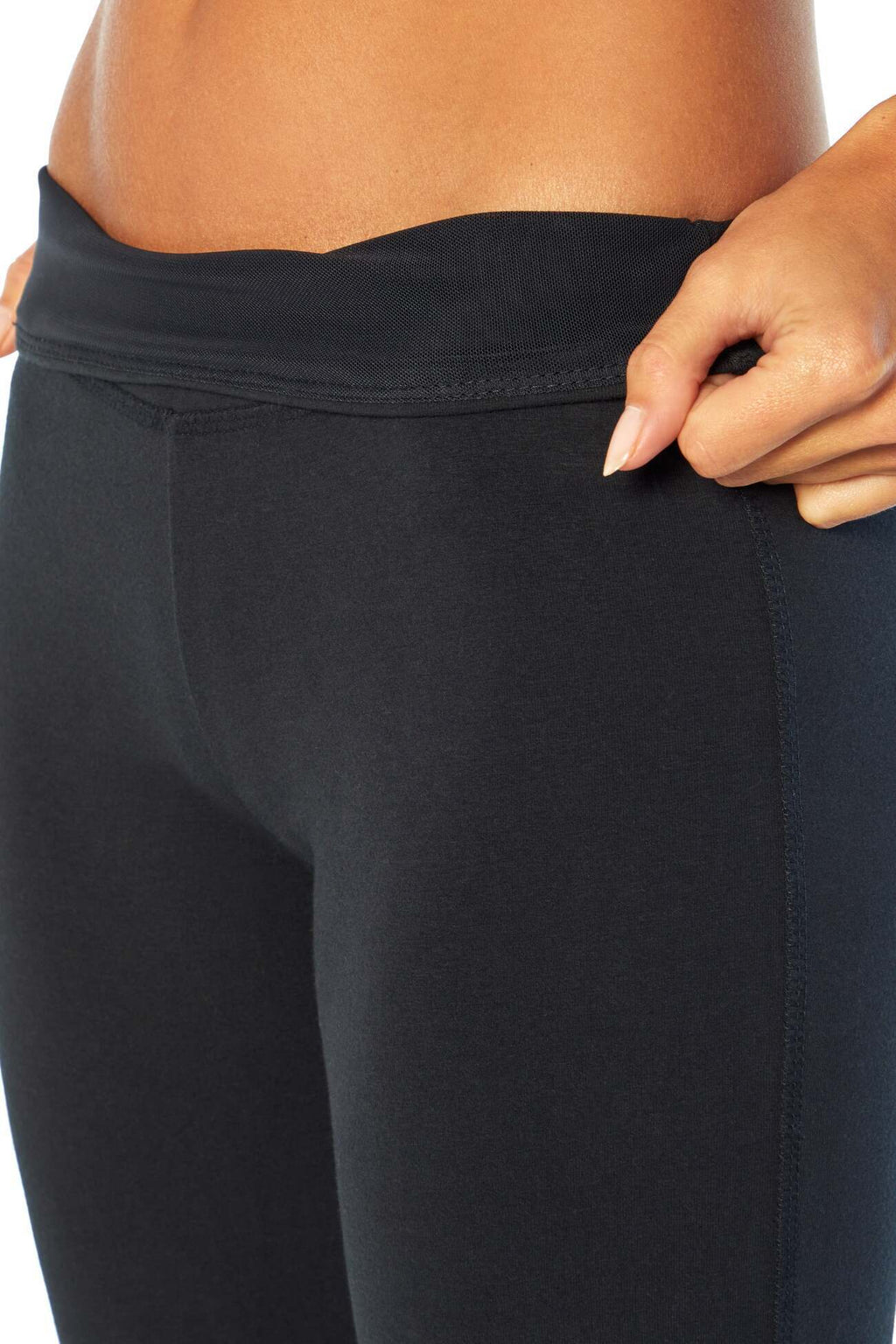 Zoey Tummy Control Capris, close-up view of fabric and stitching, showing visible design features and texture of the soft knit fabric.. #color_black