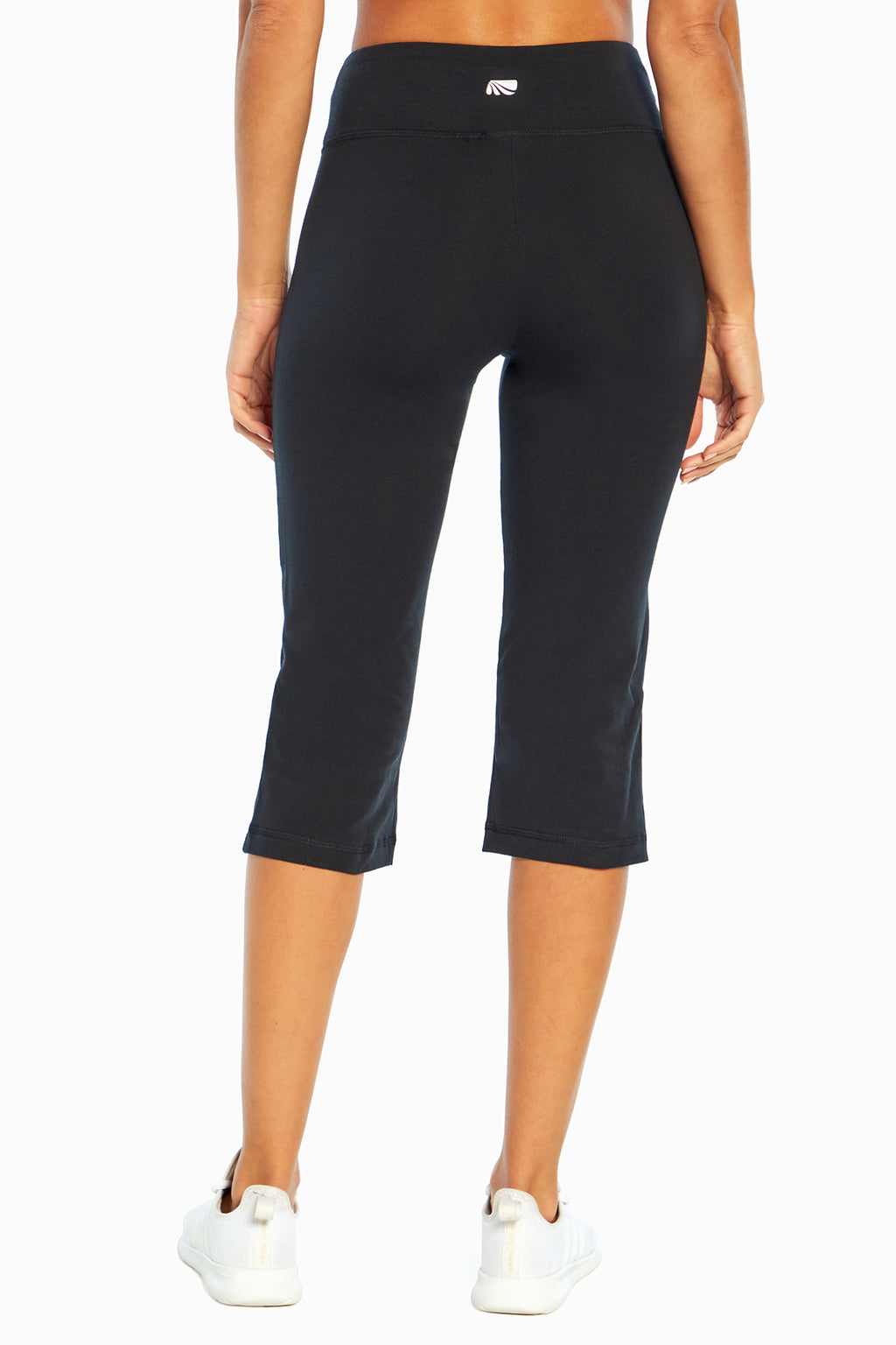 Zoey Tummy Control Capris, backview showing pocket placement, showing visible design features and texture of the soft knit fabric. #color_black