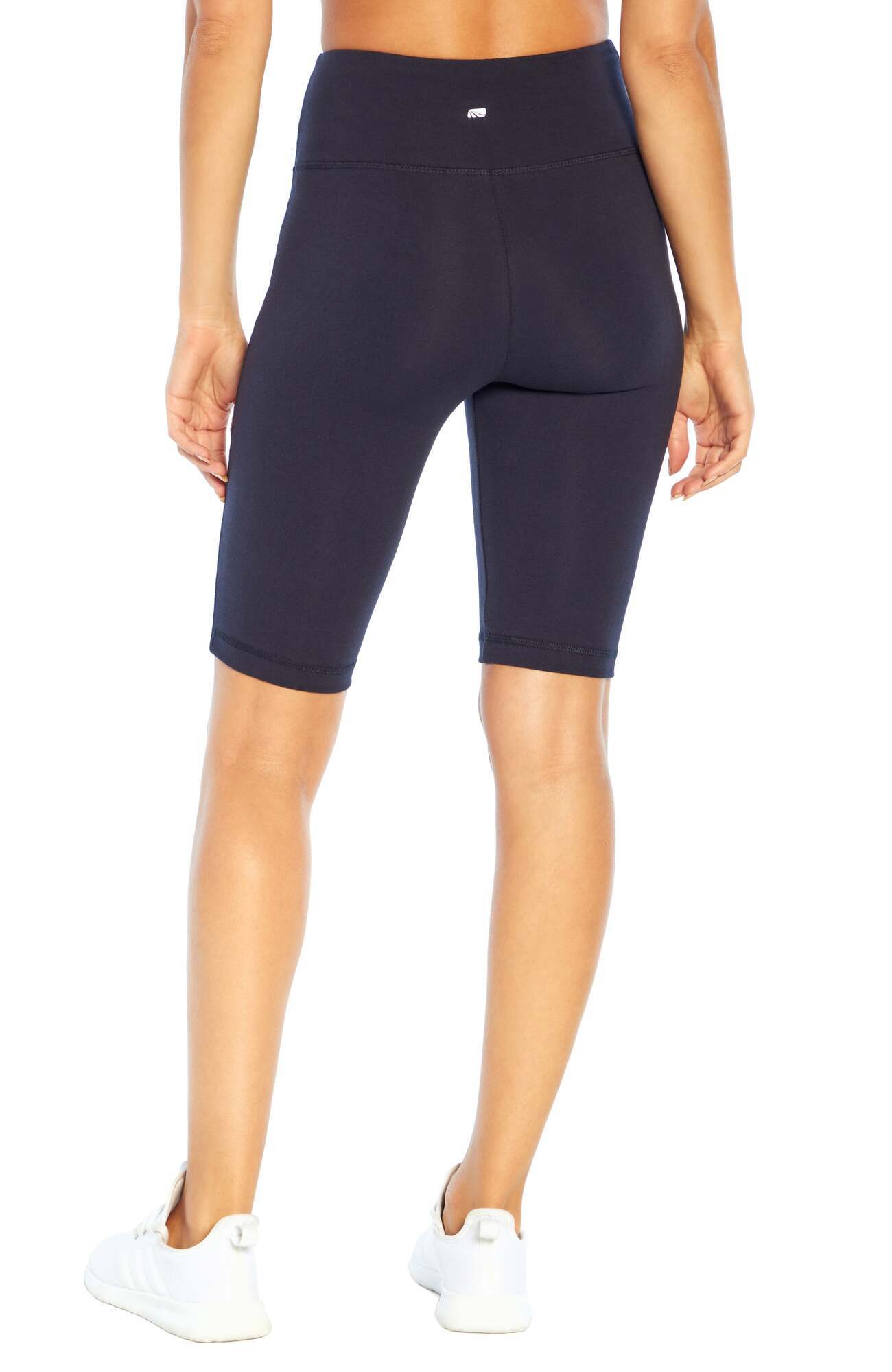 Becca Tummy Control Bermuda Shorts, close-up view of fabric and stitching, showing visible design features and texture of the soft knit fabric.. 